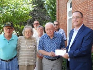 Franklin Township Historical Society members accept a check from Indiana Landmarks representative, Mark Dollaske, on August 20, 2015.