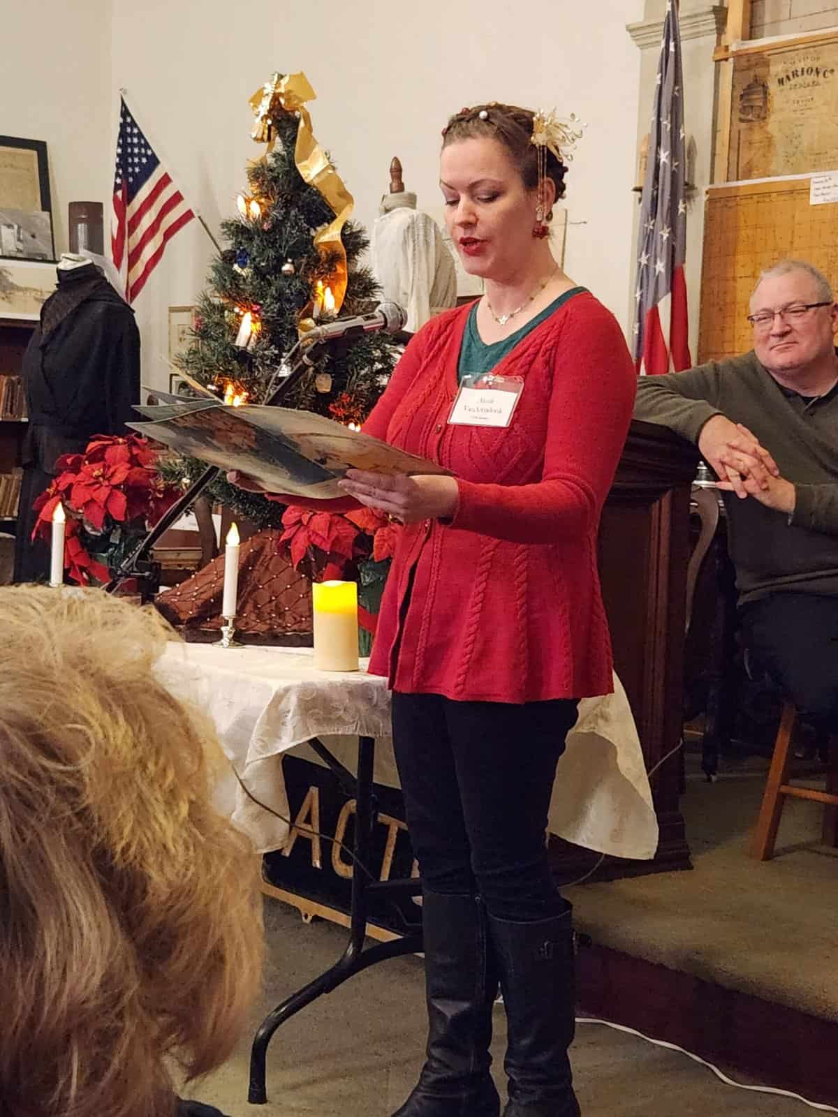 FTHS board member Alena Van Arendonk reads A Visit From St. Nicholas
